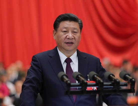 　10月18日，習(xí)近平在中國共產(chǎn)黨第十九次全國代表大會上作報告。新華社記者 鞠鵬 攝
